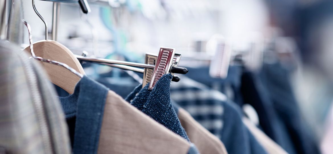 Fashionable clothes in a boutique store