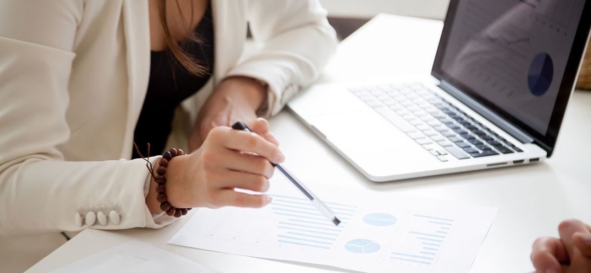 Analyzing new marketing plan and sales statistics concept, close